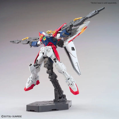 HG 1/144 Wing Gundam Zero - Boîte Bandai - Posing avec 2 fusils